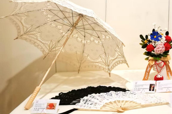 当岱岳非遗绽放在联合国 大汶口花边的温暖传承与文化交流